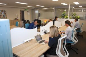 People working in a modern office space.